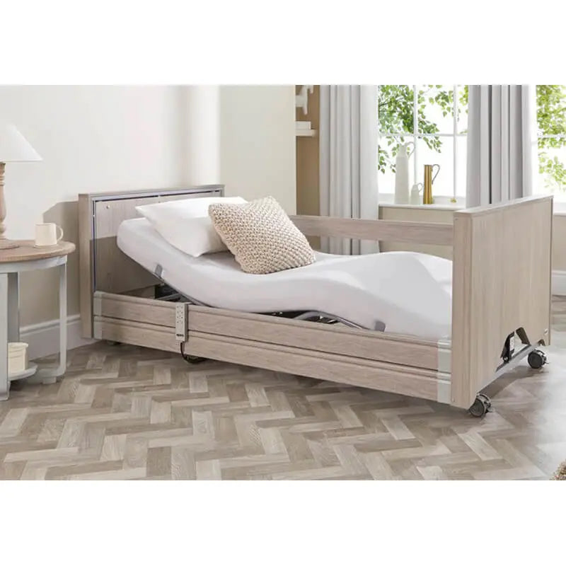 The Opera Basic 3ft Low Classic Profiling Bed With Cot Sides is perfect for those who need a little bit of extra help when it comes to getting in and out of bed. The bed can be lowered to just 22cm from the floor, greatly reducing the risk of impact injury from falls.