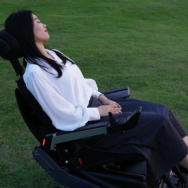 Person using a Xsto X12 All-Terrain Mobility Robot Powered Wheelchair
in an outdoor setting