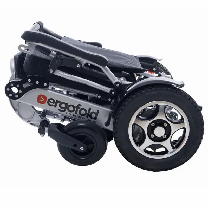 Experience the ultimate in mobility with the Ergofold Elite folding electric wheelchair. Its advanced motors, controller, and up to three batteries provide unmatched performance and range. The tension back and seat, flip-up armrests, seat belt, and 10cm cushion all contribute to a comfortable and secure ride. Plus, the white and red reflectors and 12 inch pneumatic rear wheels ensure stability and safety. With one-step quick folding, this wheelchair is perfect for those on the go.