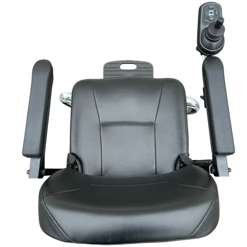 The MobilityPlus+ Quick-Split Electric Wheelchair is a compact, lightweight powerchair with a 60cm turning circle, perfect for everyday use. It easily dismantles into four pieces for effortless transport and storage, with the heaviest part weighing just 15.2kg. Features include a height-adjustable, padded swivel seat, flip-up armrests for easy transfers, and a user-friendly joystick. Travel up to 11 miles at speeds of 4mph, with added safety from electromagnetic brakes and an adjustable seatbelt. Ideal for