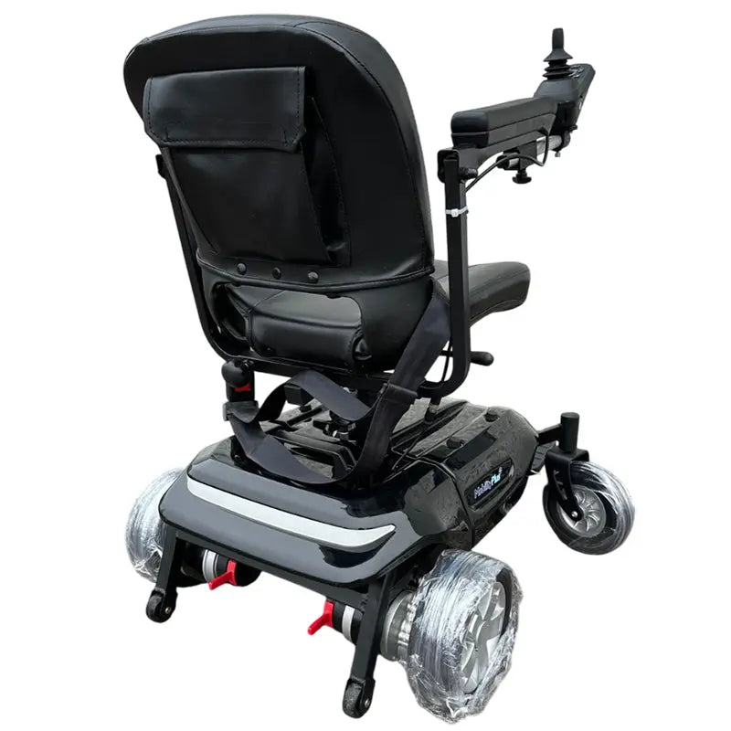 The MobilityPlus+ Quick-Split Electric Wheelchair is a compact, lightweight powerchair with a 60cm turning circle, perfect for everyday use. It easily dismantles into four pieces for effortless transport and storage, with the heaviest part weighing just 15.2kg. Features include a height-adjustable, padded swivel seat, flip-up armrests for easy transfers, and a user-friendly joystick. Travel up to 11 miles at speeds of 4mph, with added safety from electromagnetic brakes and an adjustable seatbelt. Ideal for