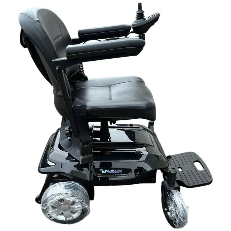 The MobilityPlus+ Quick-Split Electric Wheelchair is a compact, lightweight powerchair with a 60cm turning circle, perfect for everyday use. It easily dismantles into four pieces for effortless transport and storage, with the heaviest part weighing just 15.2kg. Features include a height-adjustable, padded swivel seat, flip-up armrests for easy transfers, and a user-friendly joystick. Travel up to 11 miles at speeds of 4mph, with added safety from electromagnetic brakes and an adjustable seatbelt. Ideal for