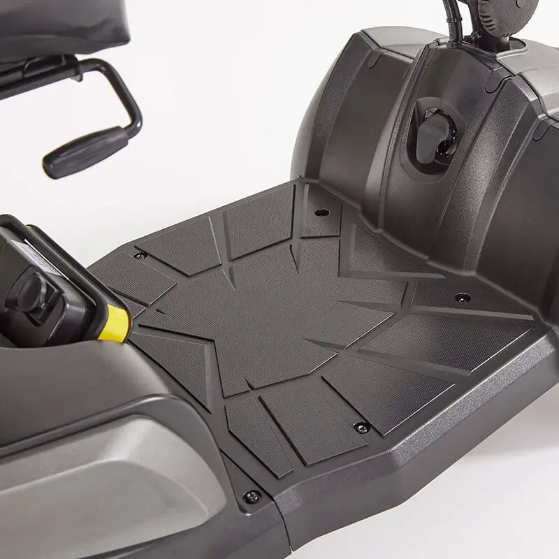 The Motion Healthcare Aura builds on the Airium's success, offering a lightweight aluminium frame (15.5kg) and a 2.6kg lithium battery with a 21-mile range. Features include pneumatic tyres, front/rear suspension, an adjustable swivelling captain's seat with flip-up armrests, and a digital LCD control panel with a front light, indicators, and adjustable delta tiller. It disassembles into six parts for easy transport, making it ideal for various terrains and travel.