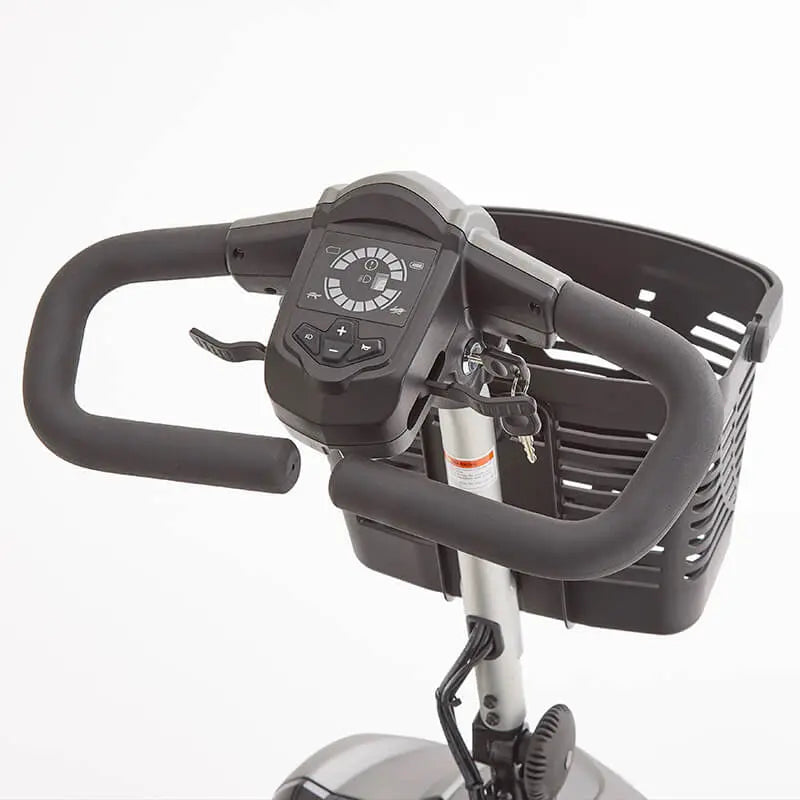 The Motion Healthcare Aura builds on the Airium's success, offering a lightweight aluminium frame (15.5kg) and a 2.6kg lithium battery with a 21-mile range. Features include pneumatic tyres, front/rear suspension, an adjustable swivelling captain's seat with flip-up armrests, and a digital LCD control panel with a front light, indicators, and adjustable delta tiller. It disassembles into six parts for easy transport, making it ideal for various terrains and travel.