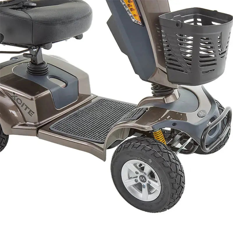 The Motion Healthcare Xcite Li Mobility Scooter offers a 45-mile range and 8 mph top speed with safe lithium phosphate batteries. It features large wheels, suspension, a padded Captain's seat, and an adjustable tiller.  Ideal for all terrains, it includes lights, indicators, a horn, and high ground clearance, supporting up to 25 stone. Additional conveniences are a storage basket and USB charging port.  The Xcite Li combines modern styling, ease of use, and robust performance for all journeys.