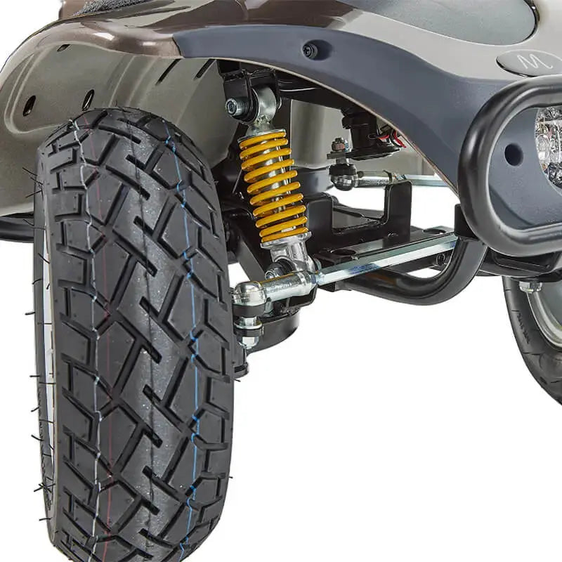 The Motion Healthcare Xcite Li Mobility Scooter offers a 45-mile range and 8 mph top speed with safe lithium phosphate batteries. It features large wheels, suspension, a padded Captain's seat, and an adjustable tiller.  Ideal for all terrains, it includes lights, indicators, a horn, and high ground clearance, supporting up to 25 stone. Additional conveniences are a storage basket and USB charging port.  The Xcite Li combines modern styling, ease of use, and robust performance for all journeys.