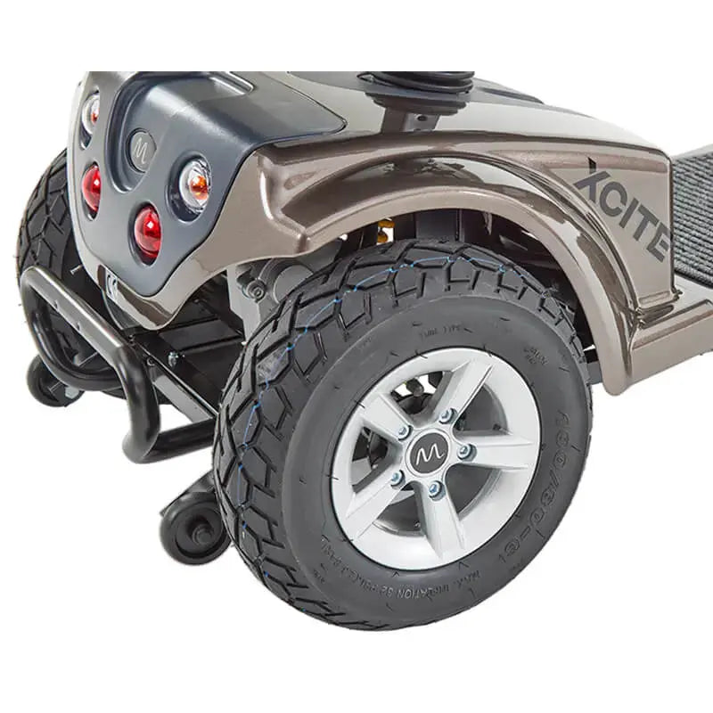 The Motion Healthcare Xcite Li Mobility Scooter offers a 45-mile range and 8 mph top speed with safe lithium phosphate batteries. It features large wheels, suspension, a padded Captain's seat, and an adjustable tiller.  Ideal for all terrains, it includes lights, indicators, a horn, and high ground clearance, supporting up to 25 stone. Additional conveniences are a storage basket and USB charging port.  The Xcite Li combines modern styling, ease of use, and robust performance for all journeys.