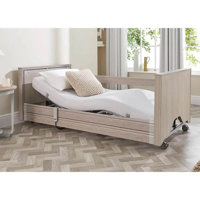 The Opera Enclosed 3ft Low Classic Profiling Bed is perfect for those who need a little bit of extra help when it comes to getting in and out of bed. The bed can be lowered to just 22cm from the floor, greatly reducing the risk of impact injury from falls.