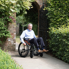 Load image into Gallery viewer, Mobility-World-UK-G-Explorer-Self-Propelled-All-Terrain-Wheelchair-Lifestyle