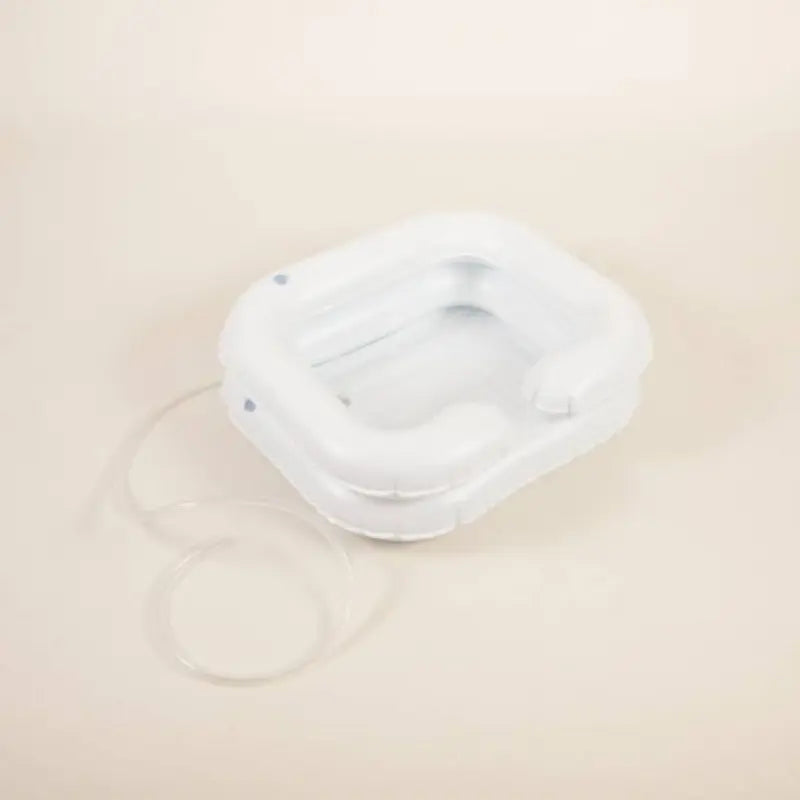 Finally, a solution for washing hair in bed. Properly position the head and shoulders for shampooing with these shampoo basins