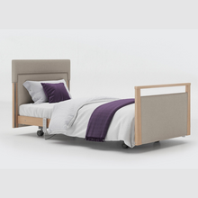 Load image into Gallery viewer, The Opera® Signature Upholstered is height adjustable for nursing and access. The bed has an extensive height range that allows it to be lowered close to the floor and raised to a carer&#39;s waist level.
