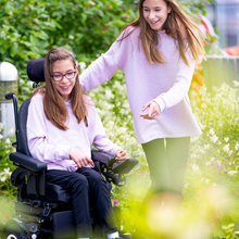 Load image into Gallery viewer, The Q300 M Mini Teens is also ridiculously compact and manoeuvrable, making it perfect for busy classrooms or hallways. There&#39;s no need to out-grow your powerchair when you can have the QUICKIE Q300 M Mini Teens.