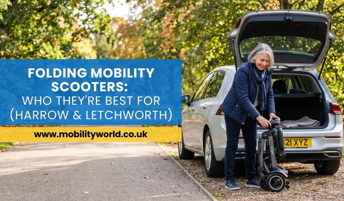 Folding mobility scooter beside a UK park pathway with car boot access for easy transport.