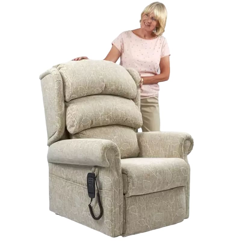 The Beacon Waterfall Dual Motor Tilt in Space Chair offers comfort and adjustability, making it ideal for individuals with limited mobility or back, hip, or knee pain. It features scroll arms, a full chaise footrest, and a three-pillow waterfall backrest. The chair can be adjusted independently, allowing for full recline and standing positions. It also features separate electric controls for backrest, leg rest, chair tilt, and riser functions.