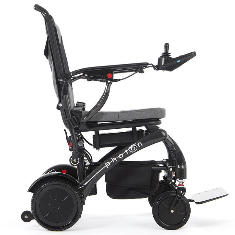 Experience next-level mobility with the Photon Folding Electric Powerchair. Weighing just 17kg without the battery and crafted from carbon fibre, it offers a 12-mile range on a single charge. Designed for users up to 23.5 stone, it combines comfort, support, and a sleek, minimalist design. Navigate busy streets or rough terrain with ease, enjoying unmatched performance and reliability. The Photon redefines lightweight, robust mobility.