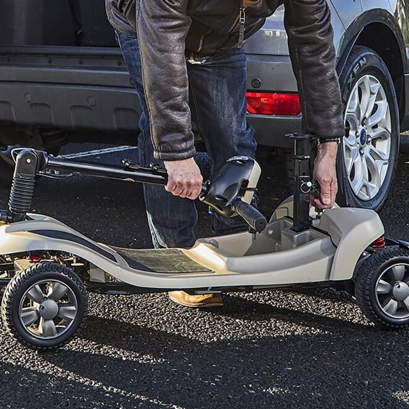 The Lithilite Air is a portable travel mobility scooter with advanced lithium battery technology and a durable steel frame. It supports a maximum user weight of 23.5 stone and offers a 10Ah battery for up to 10 miles on a single charge. With a top speed of 4 mph, it provides comfort and dependability for extended travel.