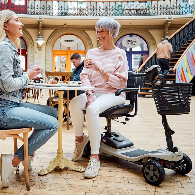 The Lithilite Air is a portable travel mobility scooter with advanced lithium battery technology and a durable steel frame. It supports a maximum user weight of 23.5 stone and offers a 10Ah battery for up to 10 miles on a single charge. With a top speed of 4 mph, it provides comfort and dependability for extended travel.