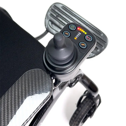 Control panel of a Quickie Q50 R Carbon Folding Powerchair with buttons and display on a white background