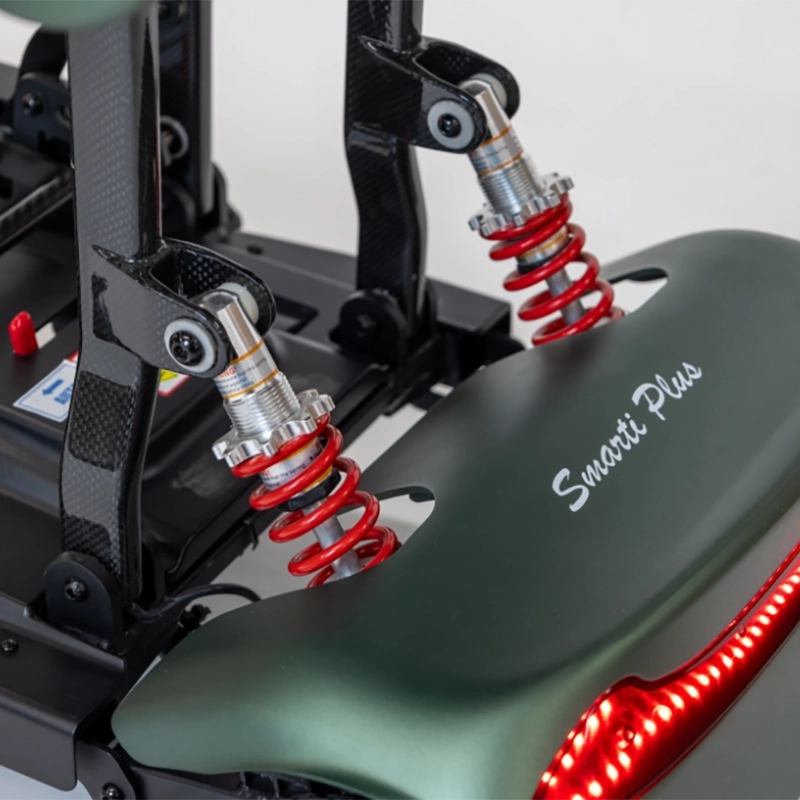 Close-up of a Smarti Plus Lightweight Auto-Folding Mobility Scooter seat with red suspension springs and 'Smarti Plus' branding.