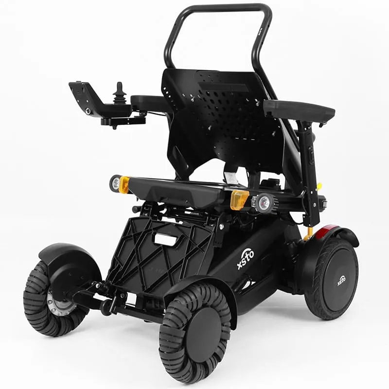 XSTO M4 Pro Smart Self Balancing Powered Wheelchair with visible branding on a white background