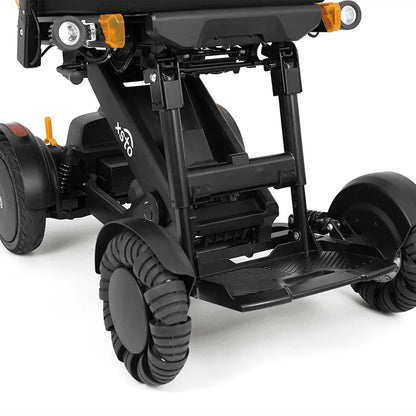 Close-up of XSTO M4 Pro Smart Self Balancing Powered Wheelchair Foot Pedal Height Adjustment with visible branding on a white background