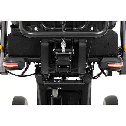 Close-up of XSTO M4 Pro Smart Self Balancing Powered Wheelchair with visible light omponents on a white background