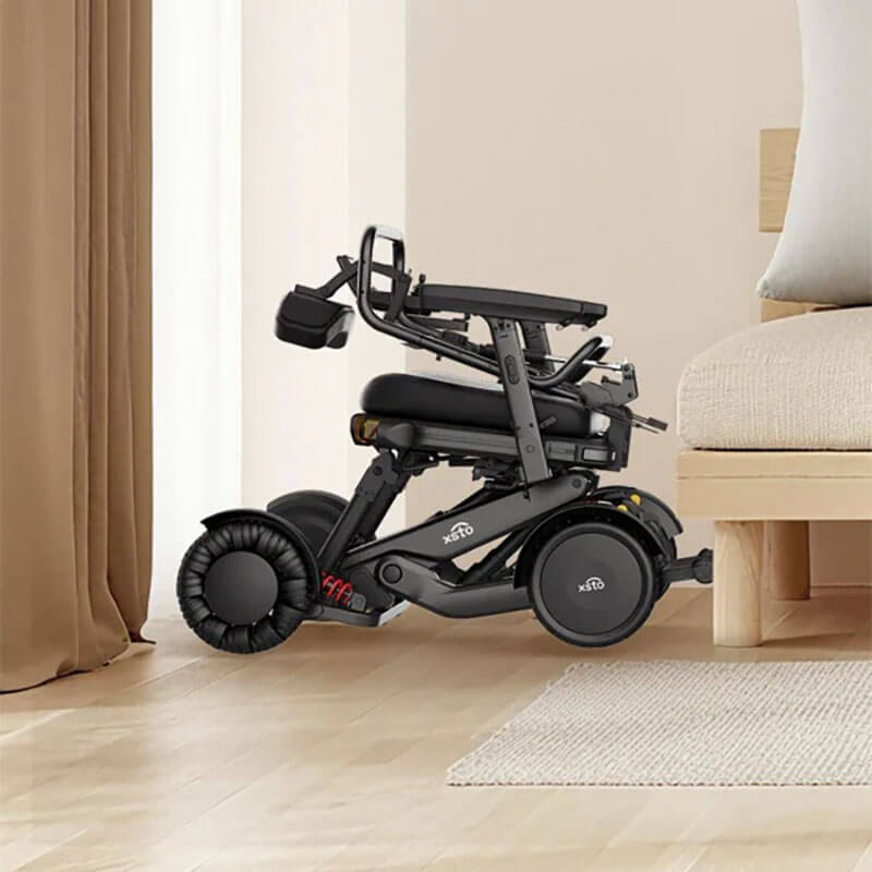 XSTO M4 Pro Smart Self Balancing Powered Wheelchair in a bedroom setting