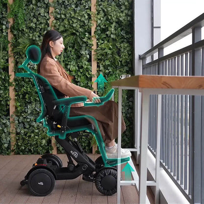 Person using XSTO M4 Pro Smart Self Balancing Powered Wheelchair on a wooden floor with plants in the background