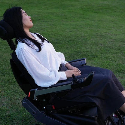 Person using a Xsto X12 All-Terrain Mobility Robot Powered Wheelchair
in an outdoor setting