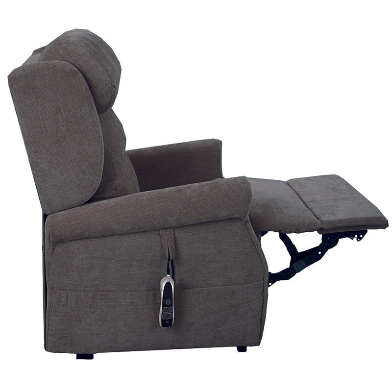 The Dinsdale Independent Dual-Motor Riser Recliner Chair offers ultimate comfort with independent backrest and footrest adjustment, a USB charging port, twin magazine pockets, and handy fabric hooks for easy control access.