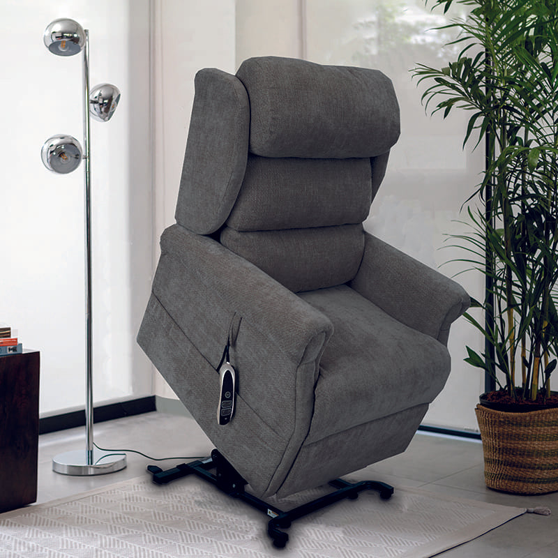 The Dinsdale Independent Dual-Motor Riser Recliner Chair offers ultimate comfort with independent backrest and footrest adjustment, a USB charging port, twin magazine pockets, and handy fabric hooks for easy control access.