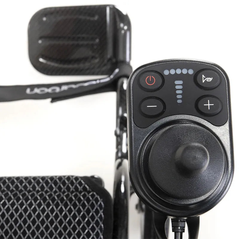 Close-up of a AeroCarbon Carbon Fibre Folding Powerchair Wheelchair control panel with buttons and joystick.