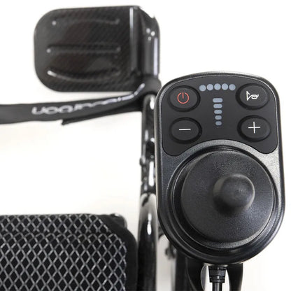 Close-up of a AeroCarbon Carbon Fibre Folding Powerchair Wheelchair control panel with buttons and joystick.