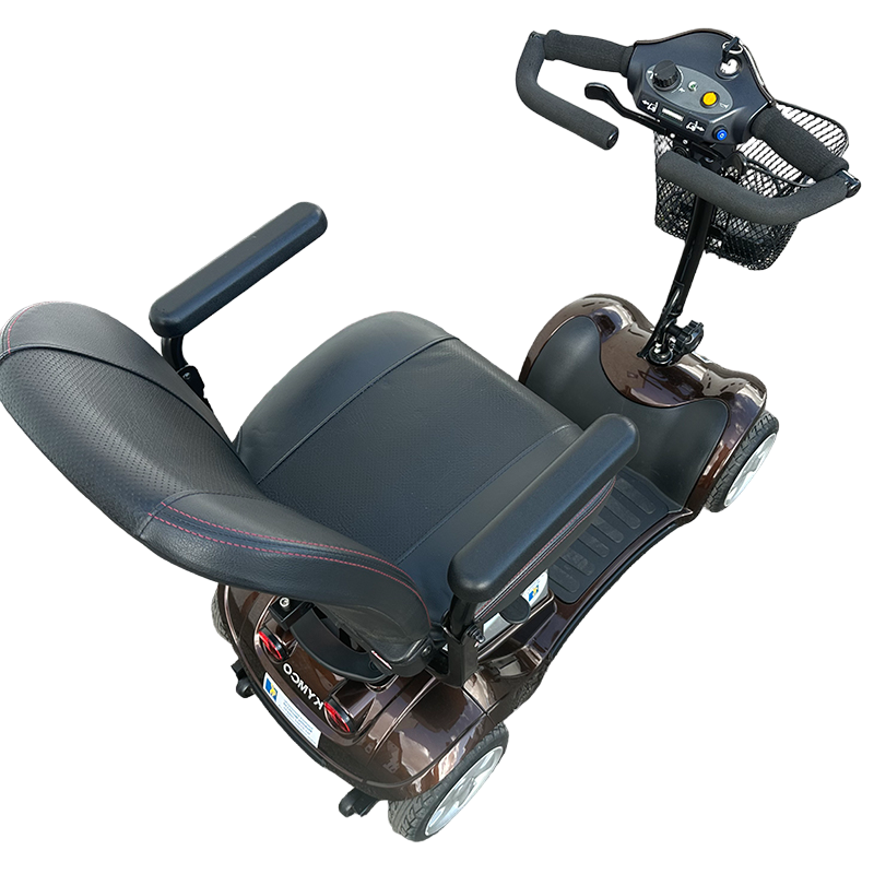 The Approved Used Kymco Mini Comfort mobility scooter is the perfect choice for people looking for a lightweight and compact model. This scooter boasts front and rear LED lighting and wireless connections, making it easy to transport and keep clean. The 9-inch soft-roll puncture proof wheels provide a comfortable ride, while the removable battery makes it easy to charge.