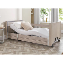 Load image into Gallery viewer, The Opera Basic 3ft Low Classic Profiling Bed is perfect for those who need a little bit of extra help when it comes to getting in and out of bed. The bed can be lowered to just 22cm from the floor, greatly reducing the risk of impact injury from falls. When coupled with floor safety mats, the risk of injury is removed almost entirely. This low height also makes it easier to swing legs onto the bed.