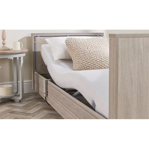 The Opera Basic 3ft Low Classic Profiling Bed is perfect for those who need a little bit of extra help when it comes to getting in and out of bed. The bed can be lowered to just 22cm from the floor, greatly reducing the risk of impact injury from falls. When coupled with floor safety mats, the risk of injury is removed almost entirely. This low height also makes it easier to swing legs onto the bed.