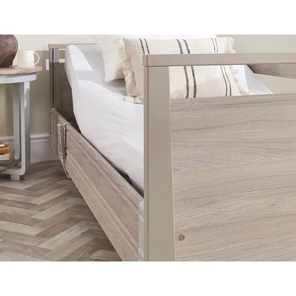 The Opera® Signature bed is height adjustable, making it suitable for both nursing care and ease of access. The bed's extensive height range allows it to be lowered close to the floor and raised up to a carer's waist level to make it easier to provide care.