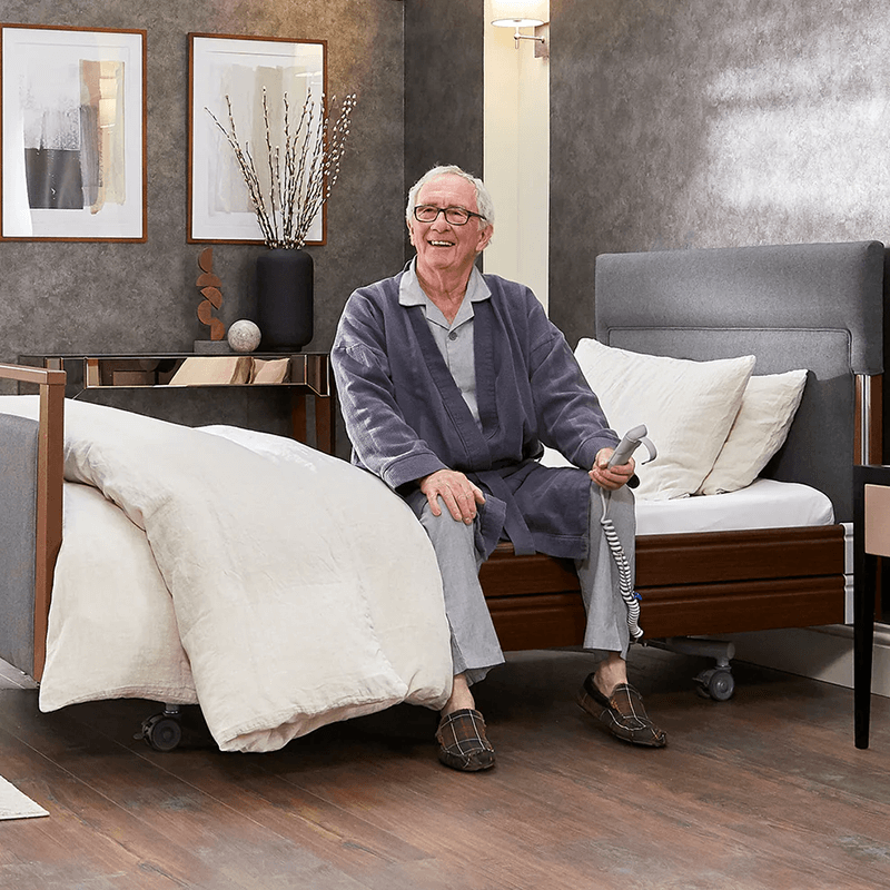 The Opera® Signature Upholstered is height adjustable for nursing and access. The bed has an extensive height range that allows it to be lowered close to the floor and raised to a carer's waist level.
