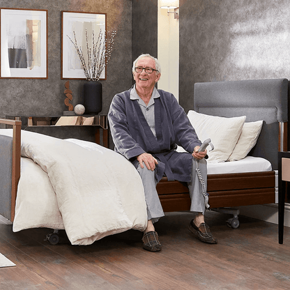 The Opera® Signature Upholstered is height adjustable for nursing and access. The bed has an extensive height range that allows it to be lowered close to the floor and raised to a carer's waist level.