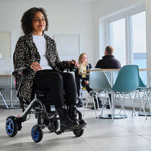 Load image into Gallery viewer, mobility_world_ltd_uk_quickie_q50_r_carbon_folding_powerchair_lifestyle