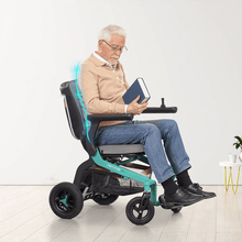 Load image into Gallery viewer, The Robooter E40 is a sleek, foldable indoor electric wheelchair that flawlessly blends performance, portability, and style. It is designed for easy daily usage, with ample leg space and a compact turning radius, and is powered by a powerful 20AH lithium-ion battery that can travel 14.3 miles on a single charge. Its lightweight design allows for easy manoeuvrability on a variety of floor surfaces, making it suitable for transportation in cars, airlines, and more.