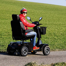 Load image into Gallery viewer, mobility_world_ltd_uk_sterling_S700_outdoor_8_mph_mobility_scooter_lifestyle