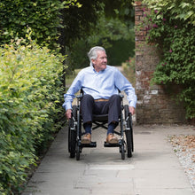 Load image into Gallery viewer, Mobility-World-UK-G-Explorer-Self-Propelled-All-Terrain-Wheelchair-actual-lifestyle
