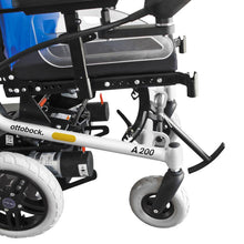 Load image into Gallery viewer, This narrow and manoeuvrable power wheelchair allows you to get into all the corners and navigate around furniture without any problems in your house or apartment, at your friends, or at your workplace. You can also cross obstacles such as carpet edges or steps in the floor up to a height of four centimetres safely with the A200. And with the optional curb climber you can climb up to approx. 8 cm.