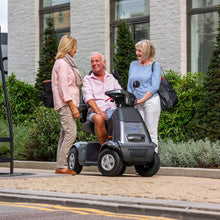 Load image into Gallery viewer, Mobility-World-UK-TGA-Breeze-Midi-4-Mobility-Scooter-Lifestyle