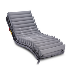 Load image into Gallery viewer, The Domus 4 is a pressure injury prevention mattress that is simple to use and provides maximum security. It features a weight setting function, CPR knob for quick deflation, heel relief for optimal protection, and a fasten the cap function that transforms the mattress into a stable surface for patient transport.