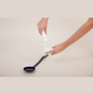 Apply cream and massage your skin at the same time with this long handled applicator