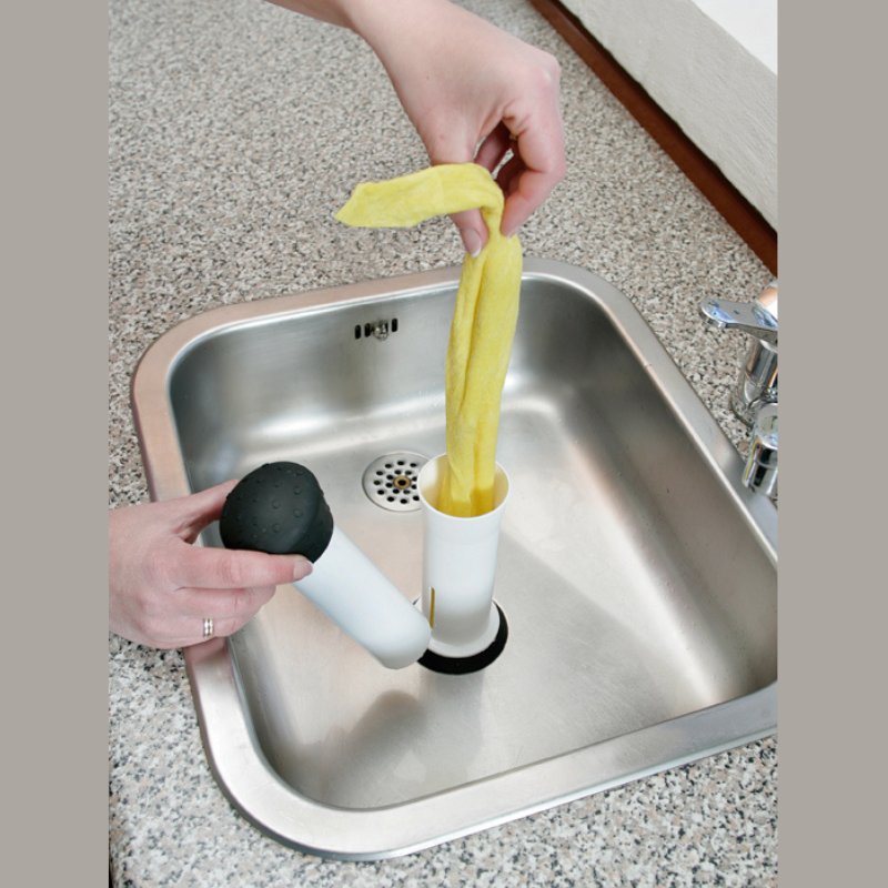 Cloth Press enables weaker hands to squeeze the water from wet cloths
