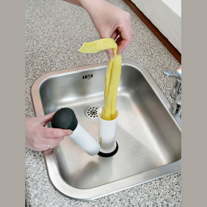 Cloth Press enables weaker hands to squeeze the water from wet cloths