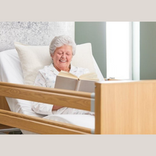 Load image into Gallery viewer, The Opera Basic 3ft Low Classic Profiling Bed With Cot Sides is perfect for those who need a little bit of extra help when it comes to getting in and out of bed. The bed can be lowered to just 22cm from the floor, greatly reducing the risk of impact injury from falls.